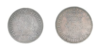 Commonwealth, Oliver Cromwell, 1658/7 silver Crown, 40mm, 29.9g. Obv: Laureate and draped bust of Cromwell, left, die flawed drapery / Rev: Crowned coat of arms of the Commonwealth. S.3226, VF. 