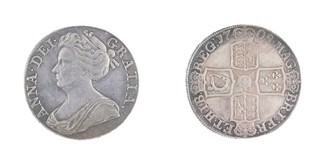 United Kingdom, Anne 1708 silver Crown, 39mm, 30.3g. Obv: Draped bust of Anne, left / Rev: Crowned cruciform shields with central Garter star. S.3601, VF, aEF (scratches). 