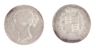 United Kingdom, Victoria, 1847 silver Crown, 38mm, 28.3g. Obv: Young uncrowned bust of Victoria, left / Rev: Crowned quartered shield of arms within wreath, national flower emblems below. XI and quinquefoil on edge. S.3382, EF. 	