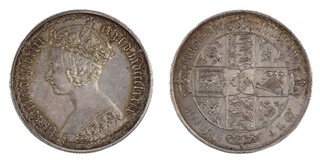 United Kingdom, Victoria, 1879 silver gothic Florin, 30mm, 11.6g. Obv: Crowned bust of Victoria, left / Rev: Crowned cruciform shields of England, Scotland and Ireland, national flower emblems in angles. S.3897, EF. 