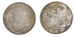 United Kingdom, Victoria, 1893 silver Crown, LVI, 39mm, 28.1g. Obv: Older bust of Victoria, left / Rev: St. George on horseback slaying the dragon right. S.3937, EF. 