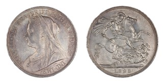 United Kingdom, Victoria, 1898 silver Crown, LXII, 39mm, 28.2g. Obv: Older bust of Victoria, left / Rev: St. George on horseback slaying the dragon right. S.3937, EF. 	