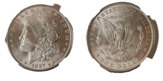 United States, 1887 silver Morgan Dollar, 38mm, slabbed coin. Obv: Liberty head, left / Rev: Eagle holding arrows and an olive branch, within wreath. KM# 110, aEF (surface marks). 