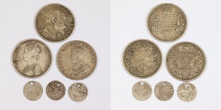 British India, three silver One Rupee coins; three small Islamic coins. EF. (6)