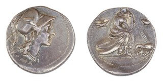 Roman Republic, 115-114 BC, silver Denarius, 20mm, Obv: Head of Roma in winged and crested corinthian helmet / Rev: Helmeted Roma seated, right, on a pile of shields, holding spear, birds in flight either side, she-wolf standing right, suckling Romulus and Remus. S.164, VF. 