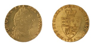 United Kingdom, George III 1798 gold Guinea, 25mm, 8.5g. Obv: Laureate head of George, right, die flaw / Rev: Spade shaped, crowned shield of arms. S.3729. 
