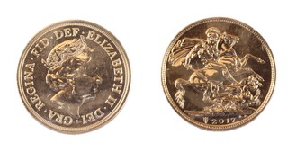 United Kingdom, Elizabeth II 2017 gold Sovereign, 22mm, 8.0g. Obv: Jody Clark portrait of Elizabeth, right / Rev: St. George on horseback slaying the dragon, right. 200th anniversary privy mark to left of date. SC9B, unc. 