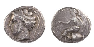 Torina, Italy, c. 445-425 BC, 21mm, silver Stater, Obv: Head of nymph Terina, hair rolled and wearing ampyx, all within wreath / Rev: Nike seated on overturned amphora holding wreath and cornucopia. S.506, F. 