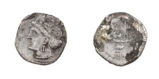 Cilicia, c. 400 BC, 10mm, silver Obol, Obv: Head of Herakles, quarter facing left, wearing lion skin / Rev: Head of Aphrodite wearing earring and necklace. F.