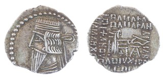 Parthian Kingdom, c.125 BC, 29mm, silver Tetradrachm, Obv: Diademed and bearded bust, facing left / Rev: Archer seated to right, on ompharos, holding bow.  F