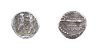 Phoenicia, Sidon, 343-335 BC, 10mm. silver Eighth Shekel, Obv: Galley on two waves / Rev: Bearded deity advancing right to slay lion. 