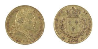 Waterloo gold 20 Francs, 1815, 21mm, 6.5g, London mint for Louis XVIII, France. Mint mark cockerel. Obv: Bare-headed bust of Louis, right / Rev: crowned Ecu of France, within laurel wreath. KM# X1. 