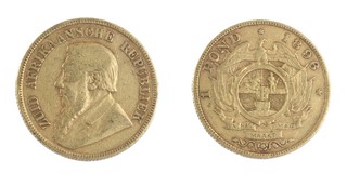 South African Republic, 1896, gold Pond, 22mm, 8.0g. Obv: Bearded bust of President Kruger left / Rev: Arms of the South African Republic below denomination and date. KM# 10.2 