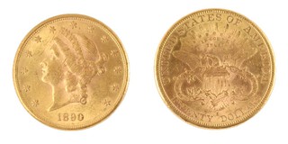 United States, 1890 gold 20 Dollars, 34mm, 33.5g. Obv: Liberty (coronet head) facing left, surrounded by 13 stars / Rev: Heraldic eagle holding three arrows and an olive branch; 13 stars, rays and motto above. KM# 74.2.