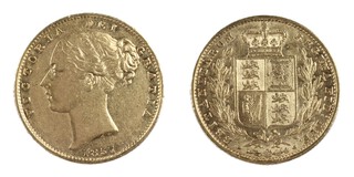 United Kingdom, Victoria 1857 gold Sovereign, 22mm, 8.0g. Obv: Bare head profile of young Victoria, left / Rev: Crowned shield of arms, within wreath. S.3852D 
