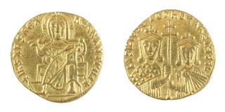 Byzantine Empire, Basil the Macedonian (867-886) gold Solidus, 19mm, 4.5g. Obv: Nimbate Christ, seated facing, raising right hand in benediction, holding Gospels with left / Rev: Crowned busts of Basil, left, and Constantine, right, holding a long patriarchal cross between them. S.1704, VF. 