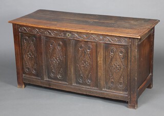 An 18th Century carved oak coffer with 3 plank top  72cm h x 139cm w x 57cm d 