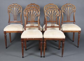 A set of 6 Edwardian bleached mahogany pierced slat back dining chairs with over stuffed seats, raised on turned supports 1002cm h x 45cm w x 42cm d (seat 21cm x 26cm) 