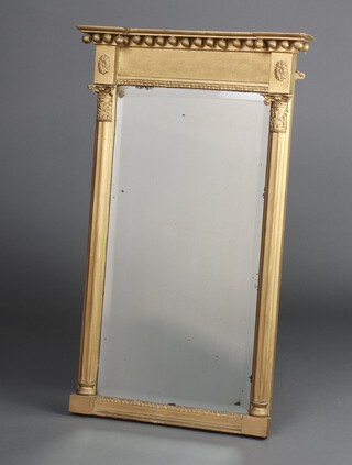 A Regency rectangular bevelled plate Pier mirror contained in a gilt painted ball studded frame flanked by reeded columns 88cm h x 53cm w x 8cm d 