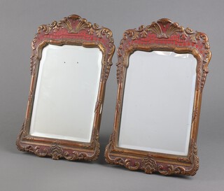 A pair of 1920's Regency style arched bevelled plate easel/dressing table mirrors, contained in red and gilt plaster frames 35cm h x 23cm w 