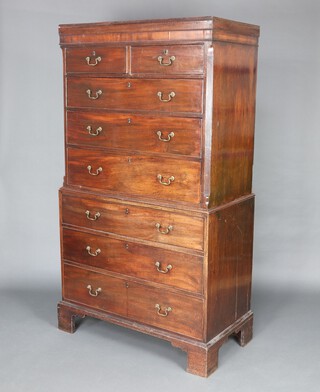 A Georgian mahogany chest on chest with moulded cornice, fitted 2 short and 3 long drawers with canted fluted corners, the base fitted 3 long drawers with brass swan neck drop handles 190cm h x 104cm w x 54cm d 