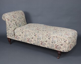 A Victorian mahogany reclining day bed upholstered in tapestry material, raised on turned supports 75cm h x 169cm l x 66cm w (seat 125cm x 43cm) 