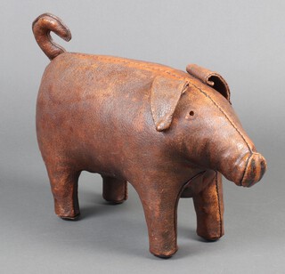 A Liberty style stool in the form of a standing pig 29cm h x 50cm w x 18cm d 