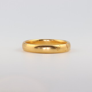 A 22ct yellow gold wedding band size V 1/2, 7.1 grams 