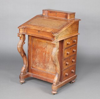 A Victorian rosewood Davenport of serpentine outline, the upper section fitted a stationery box the interior fitted drawers, the pedestal fitted 4 drawers, raised on cabriole supports 94cm h x 59cm w x 56cm d 