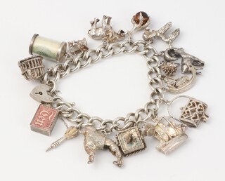 A silver charm bracelet 90 grams 