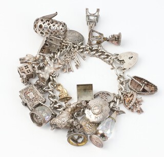 A silver charm bracelet, 107 grams gross 