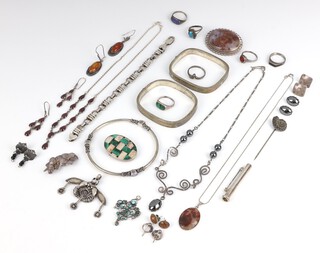 A quantity of mid-Century silver and 925 standard jewellery including bangles, rings, brooches, pendants and necklaces, weighable silver 91 grams 