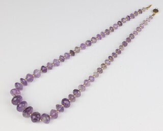 An amethyst faceted bead necklace with a 14k yellow gold clasp 50cm 