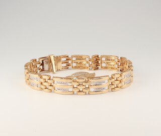 A 10ct yellow gold diamond bracelet, the diamonds approx. 0.45ct, 22.9 grams, 18.5cm (with spare link)