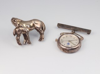 A Sterling silver horse and foal brooch 19.5 grams and a silver nurses watch