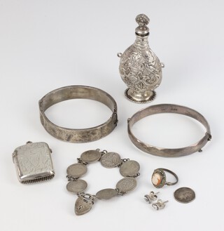 A Victorian silver vesta Birmingham 1900, a repousse silver scent bottle, 2 bangles, a bracelet and minor items, weighable silver 94 grams 