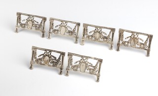 A set of 6 Victorian cast silver menu holders decorated with flowers London 1892, 140 grams 