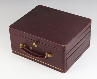 A Victorian leather jewellery casket with fitted interior and Bramah lock 27cm with key 