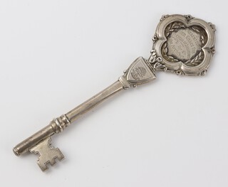 A silver presentation key with engraved inscription on the occasion of the opening of Nurses Home at County Hospital Omagh on 1st October 1930, Birmingham 1930, 12.5cm, 40 grams 