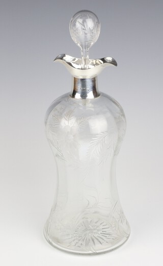 An engraved glass waisted decanter and stopper with silver lip, Birmingham 1919, 30cm 