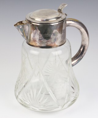 An American silver plated mounted lemonade jug with cut floral decoration 29cm 