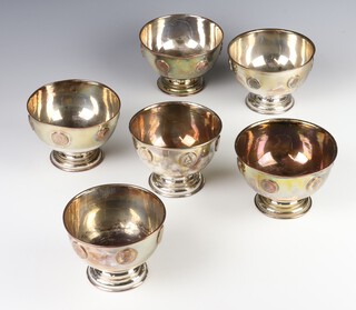 Six 19th Century silver plated coin set pedestal bowls