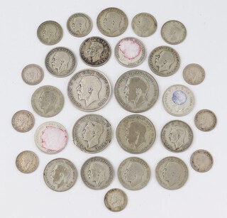 A quantity of pre-1947 coinage mainly George V including three pences, sixpences, shillings, florins and half crowns, 126 grams 