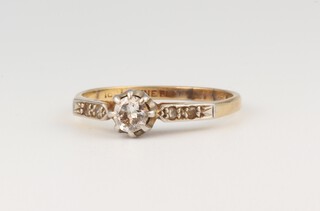 An 18ct yellow gold diamond ring, approx. 0.25ct, size M 1/2, 2.1 grams 