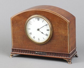 A 1920's French timepiece with enamelled dial Roman numerals, contained in an arched mahogany case 17cm x 20cm x 8cm 