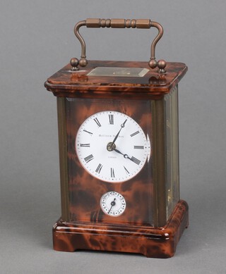 Mathew Norman, a 20th Century carriage alarm clock with 4.5cm dial, Roman numerals and alarm dial, contained in a tortoiseshell effect case, the back plate marked 1754A, complete with key