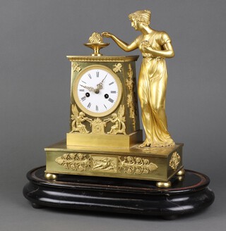 A 19th Century  French 8 day striking clock with silk suspension contained in a gilt ormolu case, the 9cm porcelain dial with Roman numerals in the form of a classical pedestal supported by a figure of a lady, complete with pendulum and key 35cm x 26cm x 13cm 