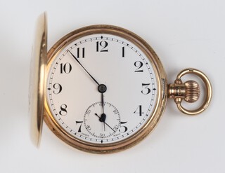 A gentleman's 9ct yellow gold hunter pocket watch with seconds at 6 o'clock, the 50mm case numbered 267034 (lacking glass), Birmingham 1923, the movement engraved Valmor and engraved monogram, gross weight 84 grams 