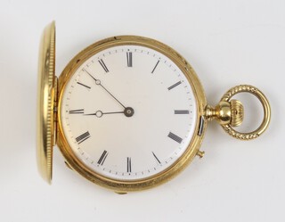 A lady's yellow gold, testing as 18ct hunter pocket watch with engraved monogram and mechanical movement, the 35mm case numbered 6381, 37.4 grams gross 
