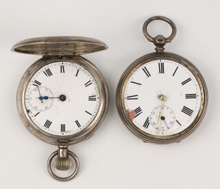 A Victorian silver key wind pocket watch with seconds at 6 o'clock, Birmingham 1883, the 50mm case numbered 12948 together with a key wind ditto 925 standard the 50mm case numbered 815, the movement 155/2 with seconds at 6 o'clock  